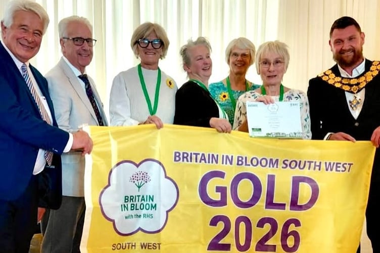 Newquay in Bloom with its gold award alongside mayor Drew Creek